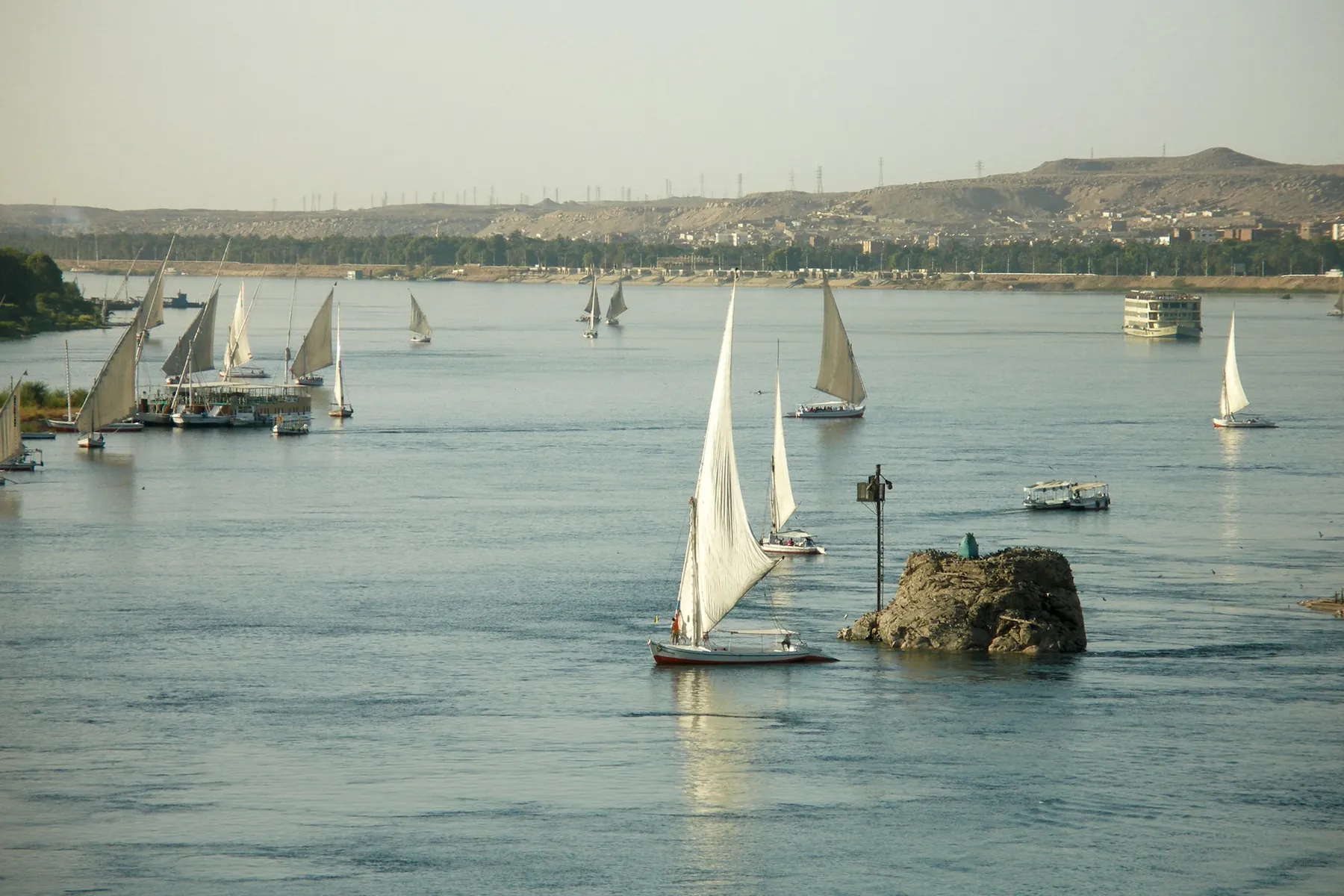 Feluccas on the Nile at Aswan, with the West Bank behind