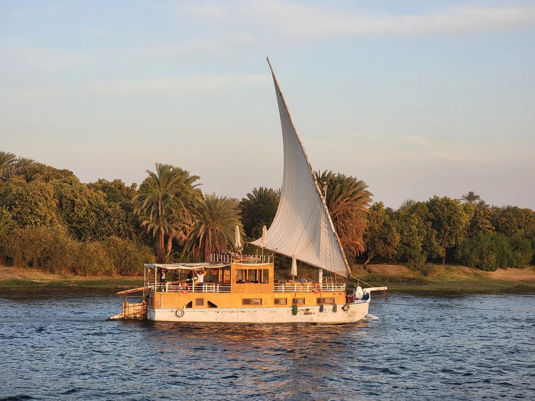 A dahabiya sailing on the Nile